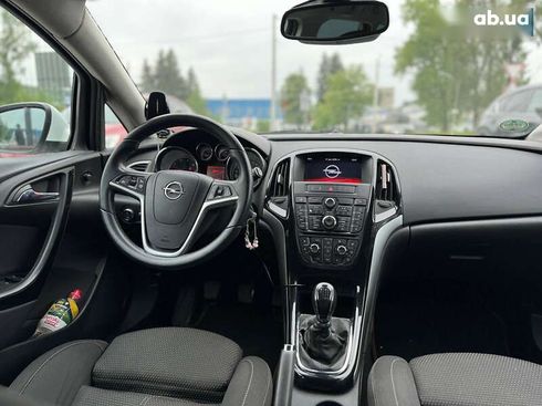 Opel Astra 2014 - фото 8
