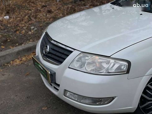 Nissan Almera 2011 - фото 6