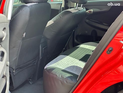 Toyota Corolla 2009 красный - фото 28