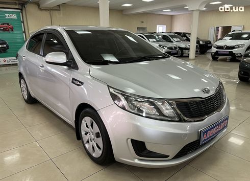 Kia Rio 2012 серебристый - фото 11