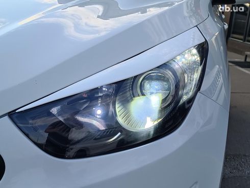 Hyundai Tucson 2010 белый - фото 11