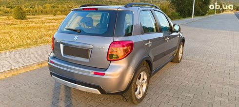 Suzuki SX4 2011 серебристый - фото 5