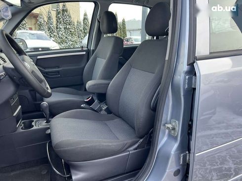 Opel Meriva 2009 - фото 11