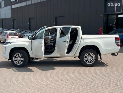 Mitsubishi l 200 2019 белый - фото 15