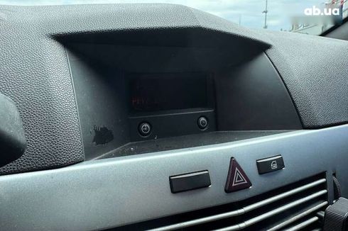 Opel Astra 2010 - фото 21
