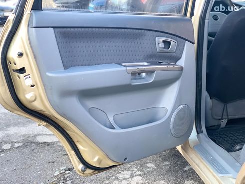 Kia Carens 2003 бежевый - фото 17