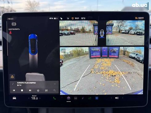 Tesla Model Y 2024 - фото 17