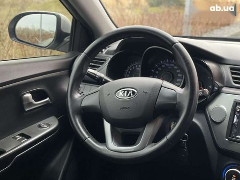 Kia Rio 2012 - фото 13