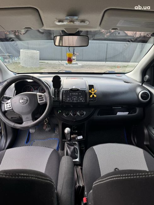 Nissan Note 2011 серебристый - фото 2