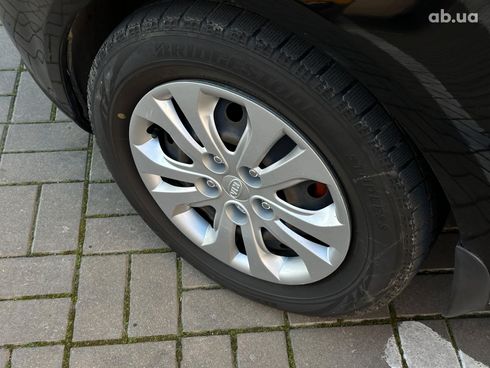 Kia Cerato 2009 черный - фото 7