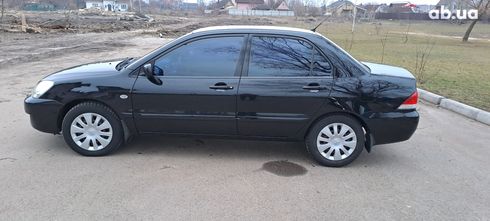 Mitsubishi Lancer 2008 черный - фото 15