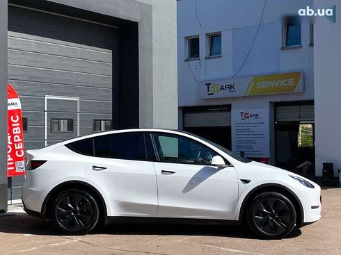 Tesla Model Y 2024 - фото 11