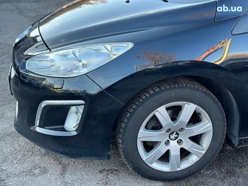 Peugeot 308 2011 черный - фото 33