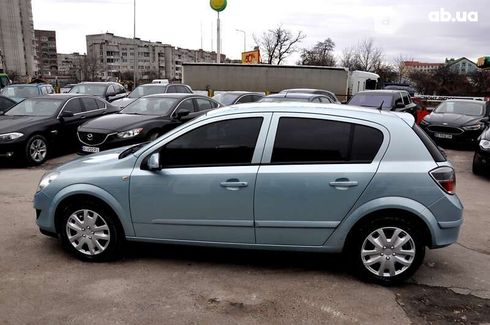 Opel Astra 2009 - фото 13