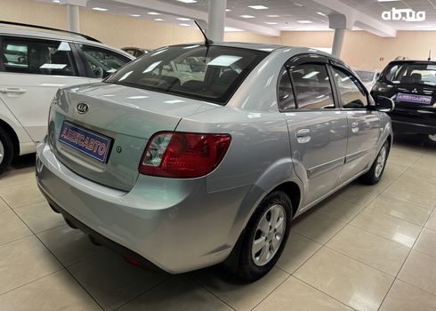 Kia Rio 2010 серебристый - фото 13