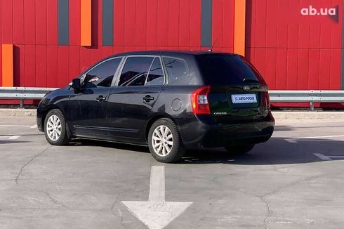 Kia Carens 2010 - фото 5