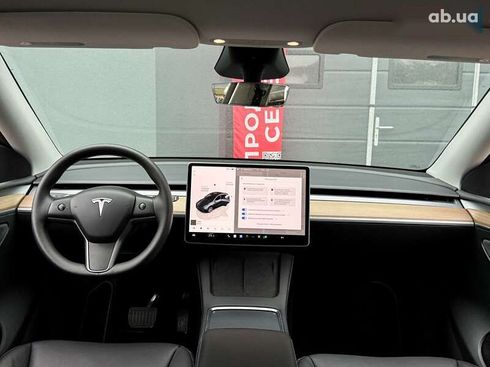 Tesla Model Y 2024 - фото 17