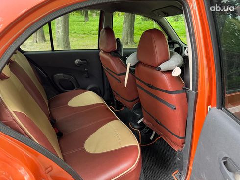 Nissan Micra 2004 оранжевый - фото 9