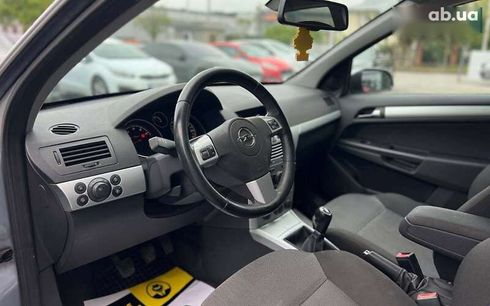 Opel Astra 2009 - фото 8