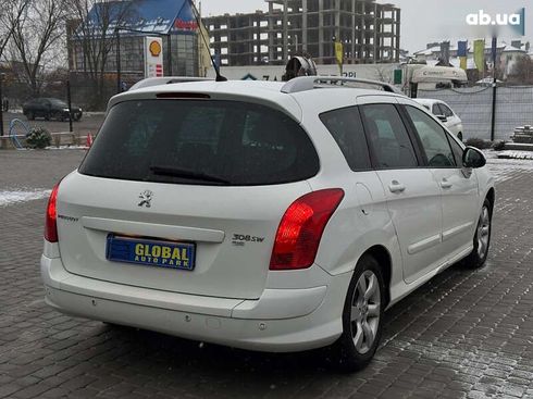 Peugeot 308 2012 - фото 18