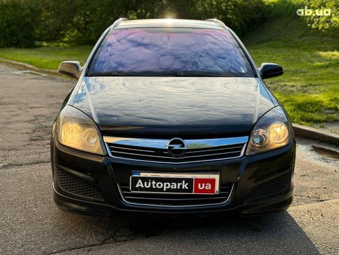 Opel Astra 2009 черный - фото 2