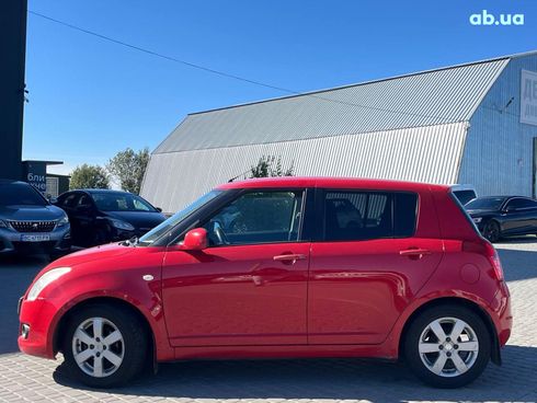 Suzuki Swift 2010 красный - фото 9