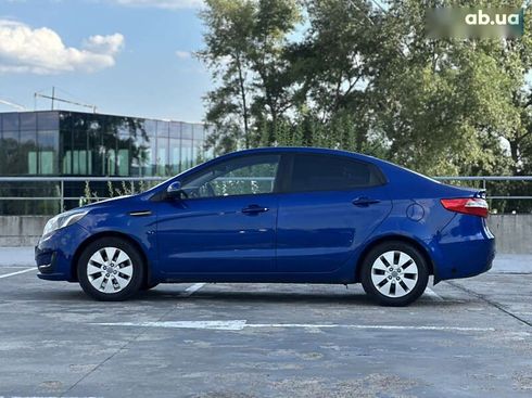 Kia Rio 2013 - фото 11