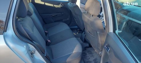 Opel Astra 2009 серебристый - фото 3