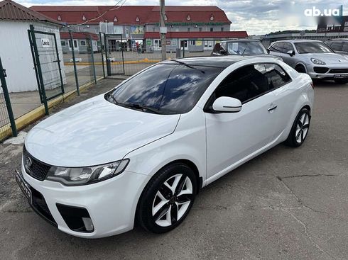 Kia Cerato 2011 - фото 12