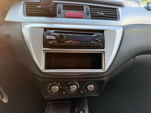 Mitsubishi Lancer 2006 - фото 24
