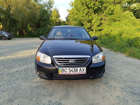 Kia Cerato 2007 черный - фото 7