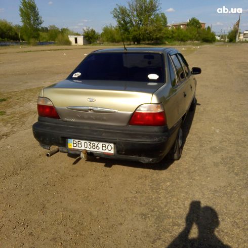 Daewoo Nexia 2007 бежевый - фото 3