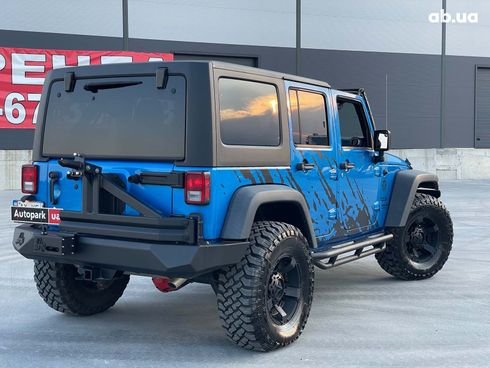 Jeep Wrangler 2014 синий - фото 9