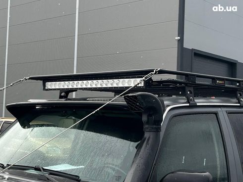 Nissan Patrol 2009 серый - фото 147