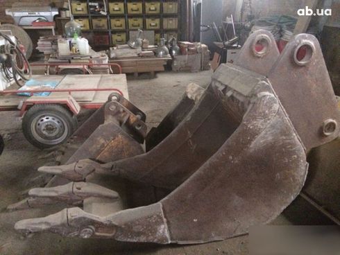 Komatsu WB 2007 - фото 12