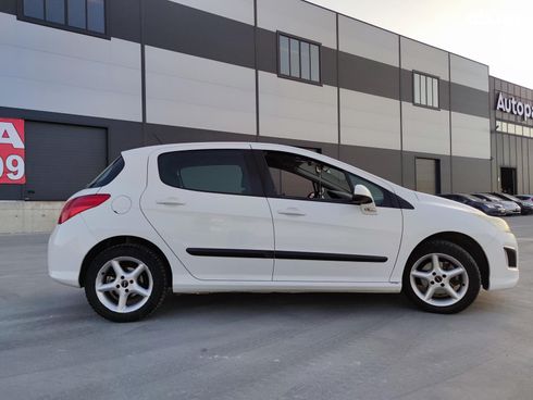 Peugeot 308 2011 белый - фото 14