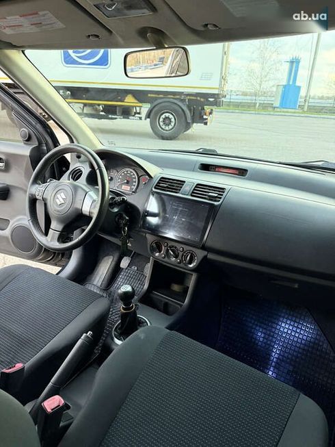 Suzuki Swift 2010 - фото 13