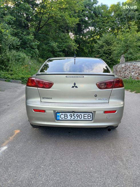 Mitsubishi Lancer 2008 золотистый - фото 5