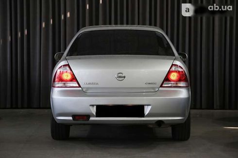Nissan Almera 2012 - фото 6