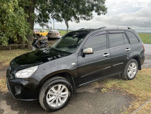 Chery Tiggo 2014 черный - фото 18