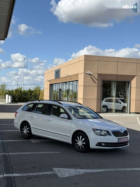 Skoda Superb 2014 - фото 20