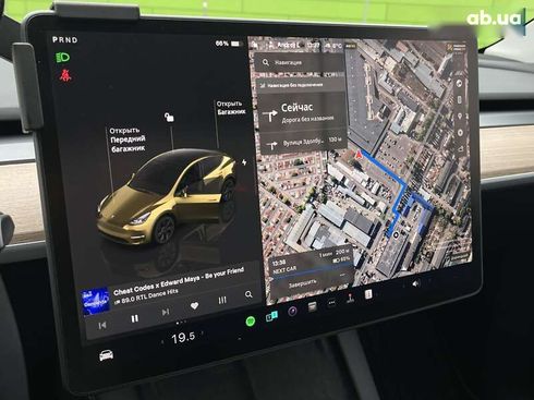 Tesla Model Y 2024 - фото 29