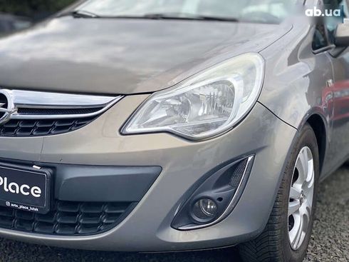 Opel Corsa 2011 - фото 10