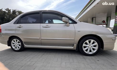 Suzuki Liana 2007 золотистый - фото 5