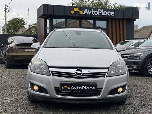 Opel Astra 2010 - фото 18