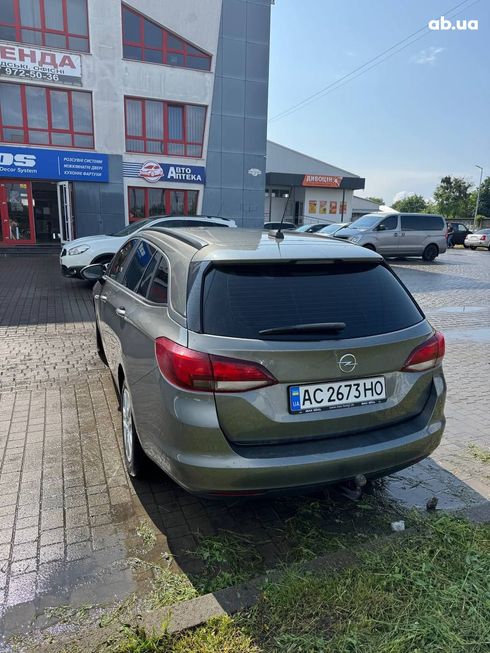 Opel Astra K Sports Tourer 2019 серебристый - фото 9