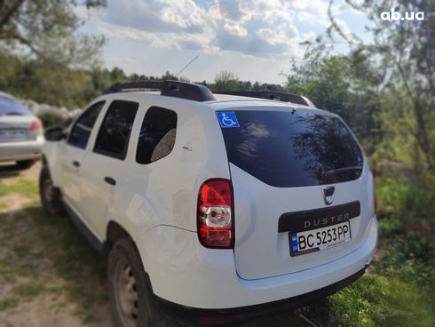 Dacia Duster 2016 белый - фото 8