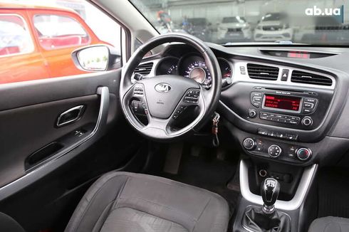 Kia Cee'd 2014 - фото 12