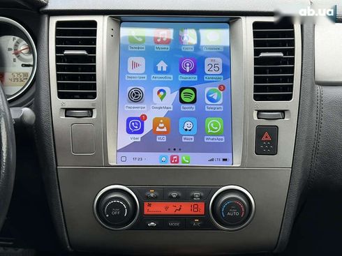 Nissan Tiida 2011 - фото 24
