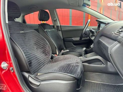 Kia Rio 2012 - фото 12
